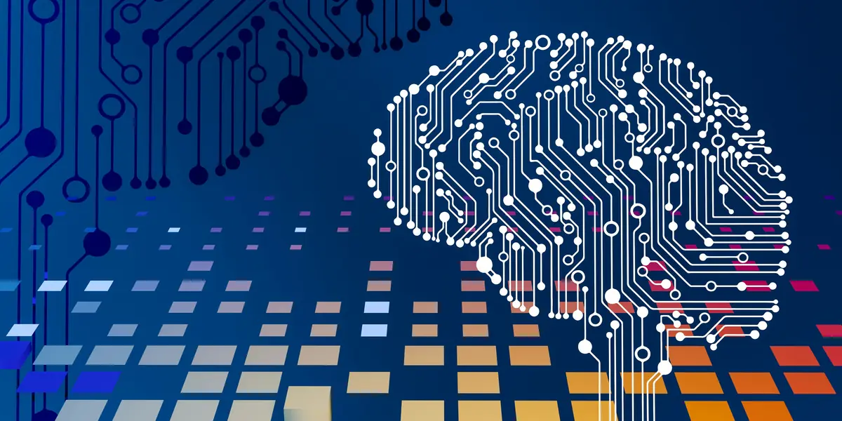 Illustration on a dark blue background: the outline of a brain drawn from white printed-circuit traces with glowing nodes, above a grid of squares in orange, blue and cream