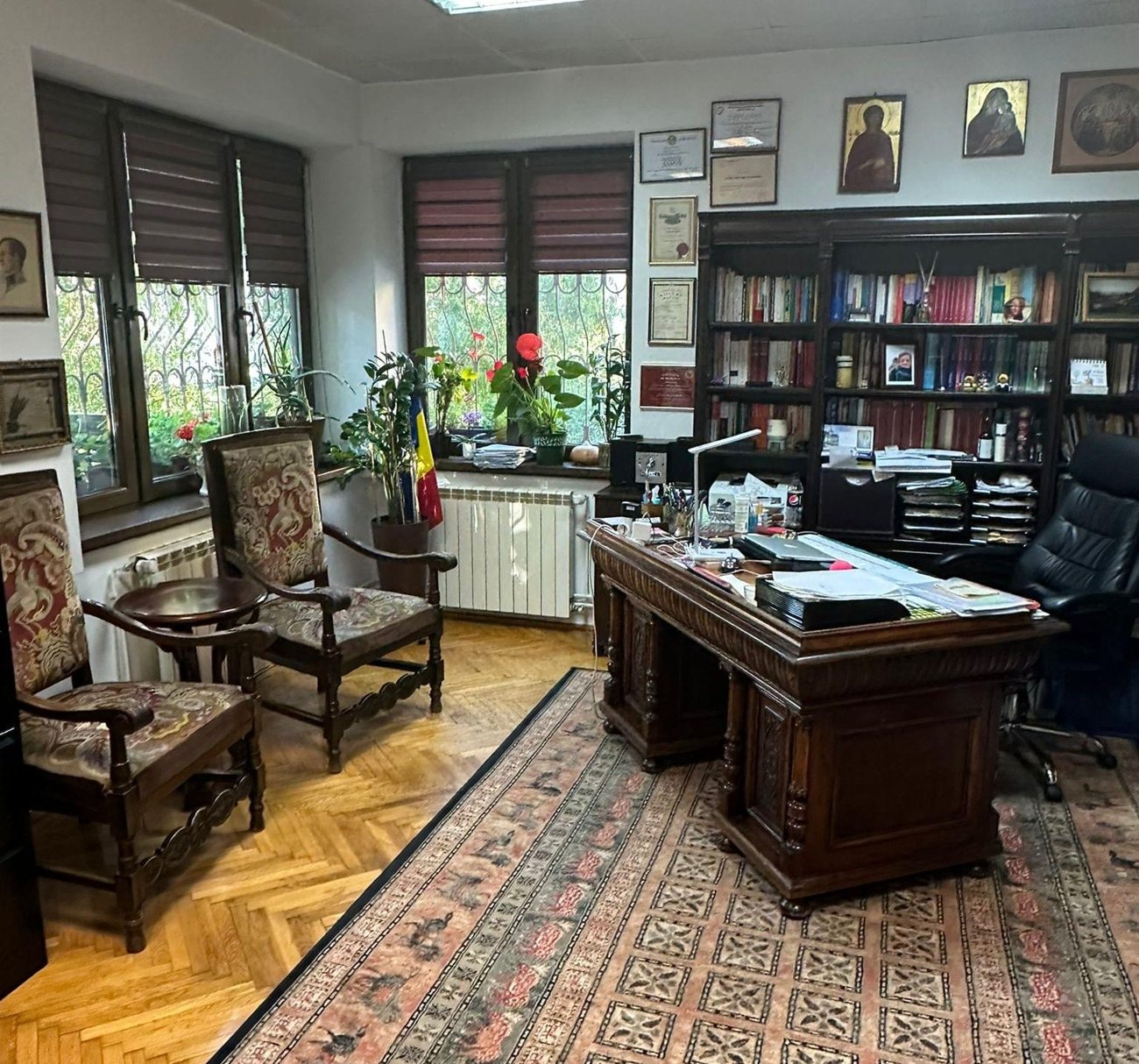 Inside the Gidro & Gidro office — bookshelves, framed diplomas, a quiet room built for a first meeting